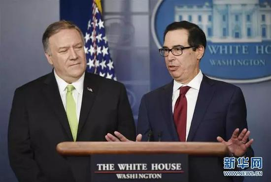  1月10日，美国财政部长姆努钦（右）在华盛顿白宫举行的记者会上发言&nbsp; （图片来源：新华社记者 刘杰 摄）