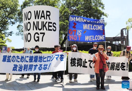 日本民眾抗議G7峰會的召開。圖源：新華社