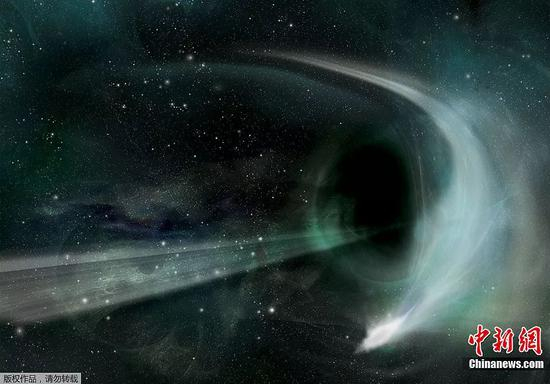 资料图：2011年8月，天文学家首次抓拍到黑洞吞噬恒星的过程，这被认为是目前宇宙最神秘、最震撼的情景。