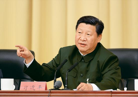 2014年10月30日，全军政治工作会议在福建省上杭县古田镇召开。10月31日，中共中央总书记、国家主席、中央军委主席习近平出席会议并发表重要讲话。 新华社记者 李刚/摄