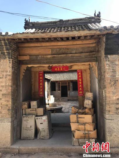 图为村里为了发展旅游翻修的四合院。　张帆　摄