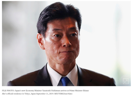西村康稔。/ 路透社网站截图