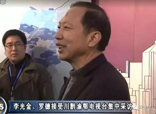 2011年3月，李光金、罗德共同接受电视台采访。上图为李光金