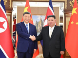 习近平同金正恩举行会谈