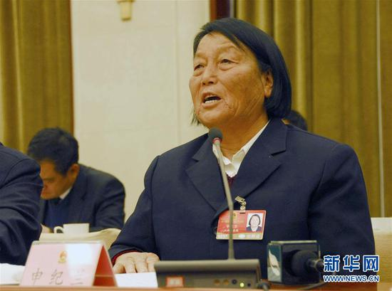  2009年3月5日，全国人大代表申纪兰在审议政府工作报告时发言。新华社记者 邹伟/摄
