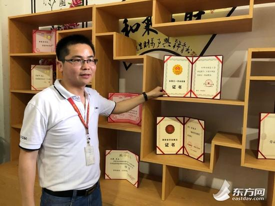 图片说明：刘建兵和他的团队获得的荣誉