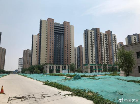 协议写明24个月回迁，9年后仍有回迁房尚未动工