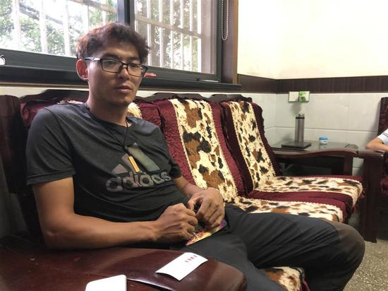 　12日傍晚，章军返回淳安家中。 顾杰 摄