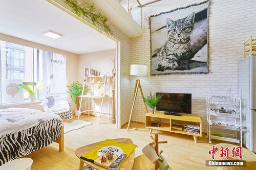 资料图：杭州市一位居民家中的房间。中新社发 牛镜 摄 图片来源：CNSPHOTO