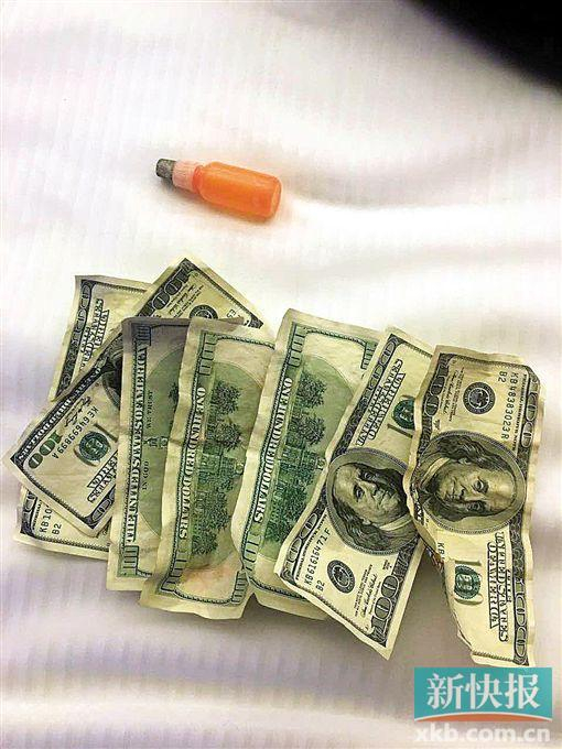  疑犯在演示“洗”钱过程。&nbsp;通讯员供图&nbsp;