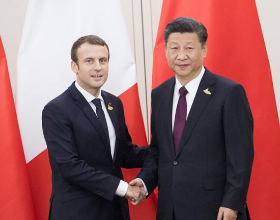 7月8日，国家主席习近平在汉堡会见法国总统马克龙。新华社记者 李学仁 摄