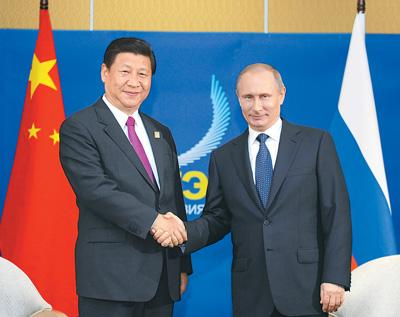 2013年10月7日，国家主席习近平在印度尼西亚巴厘岛会见俄罗斯总统普京。新华社记者　张铎摄