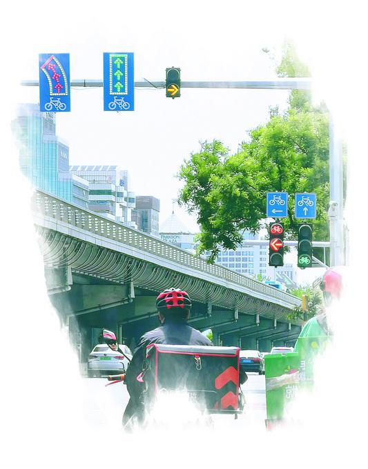 月坛北桥下新增非机动车专用信号灯。