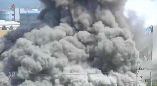  （图说：朝鲜中央电视台播放爆破全过程）