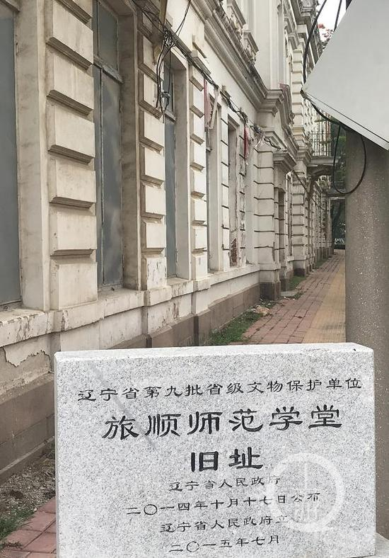 ▲省级文保单位与破烂的墙体。摄影/上游新闻记者 张莹