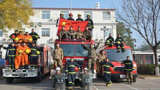  2014年，八大街中队全队合影。&nbsp; 受访者供图