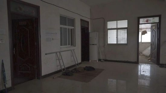 12月12日，韩仕梅家二楼，只留了两间房子作儿女的卧室，其他都租给了附近的工人。新京报记者 戚厚磊 摄