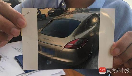 当事人廖先生出示他曾“购得”的保时捷。