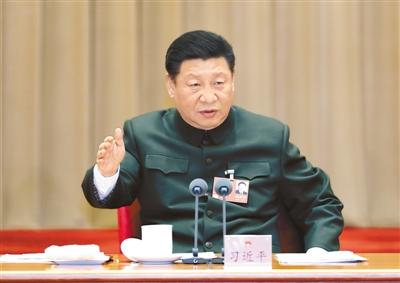 2018年3月12日，中共中央总书记、国家主席、中央军委主席习近平出席十三届全国人大一次会议解放军和武警部队代表团全体会议并发表重要讲话。新华社记者 李 刚摄