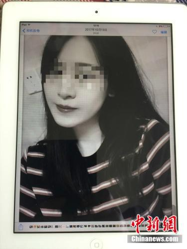 杨敢连将女儿杨俪萍照片存在ipad里。 杨敢连供图