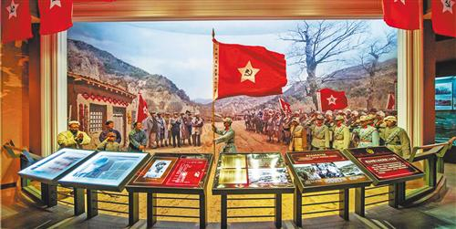 南梁革命纪念馆内的红二十六军二团成立情景。 鲍子文摄