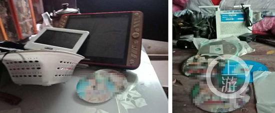  ▲犯罪嫌疑人龙某和家中，两部DVD影碟机和部分淫秽碟片。摄影/上游新闻记者 牛泰