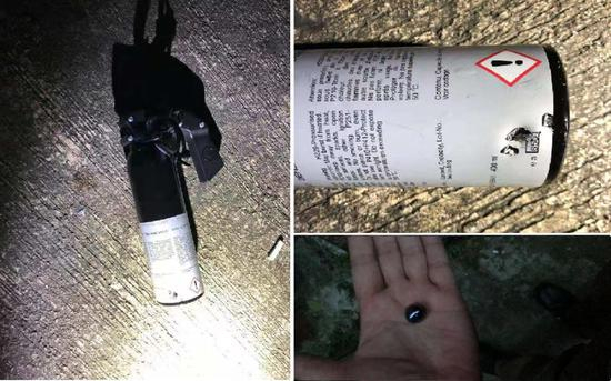  现场发现暴徒自制的燃烧弹及钢珠