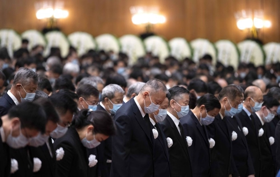  12月6日上午，中共中央、全国人大常委会、国务院、全国政协、中央军委在北京人民大会堂隆重举行江泽民同志追悼大会。新华社记者 李涛 摄