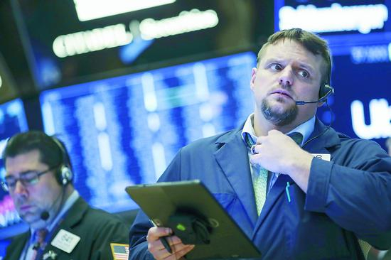 中美贸易摩擦的升级令美国股市动荡。图为14日的美国纽交所。