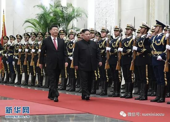 会谈前，习近平在人民大会堂北大厅为金正恩举行欢迎仪式。 新华社记者 申宏 摄