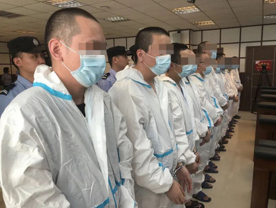  岳阳中院2000万荐股骗局案中的被告人。来源：岳阳中院