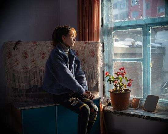 高明，生于1995年，2003年齐齐哈尔“八四”毒气事件的受害者。