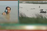 巴基斯坦暴雨 记者下河报道