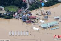 日本东北暴雨致河流决堤 居民区被淹