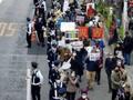 日本民众走上街头高呼口号:要求取消奥运会