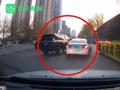 沈阳街头两车疑似开斗气车 越野车司机故意撞上宝马还怒踢其车门