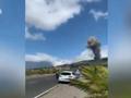 震撼!西班牙拉帕尔马岛火山喷发:巨型烟柱喷出、岩浆吞噬道路