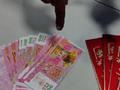 南宁男子买手机丢下一沓冥币后开溜