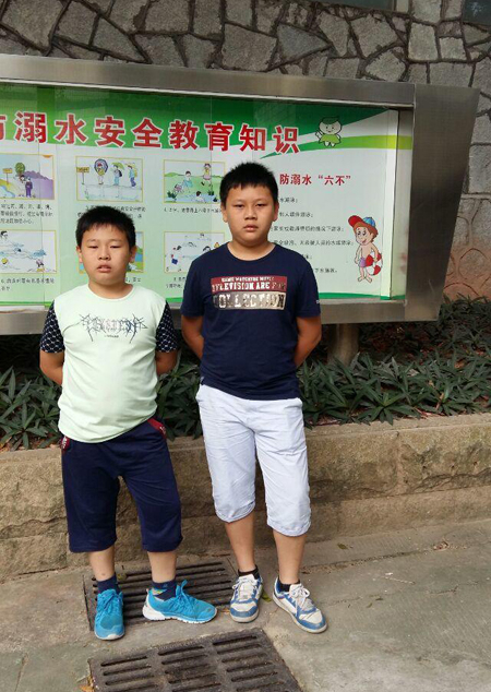 何卫生失联的两个儿子何玉龙和何伟豪。