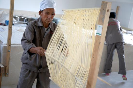 佳县空心手工挂面历史悠久、制作精良，主要以通镇陈家墕村最有代表。