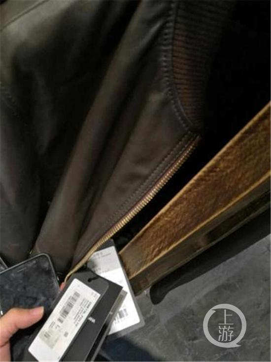 △张先生买来的皮衣。