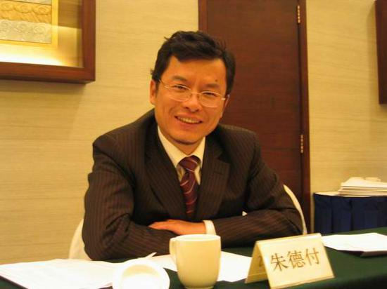 《京华时报》创刊者朱德付