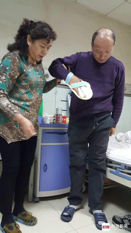 李建利夫妇。