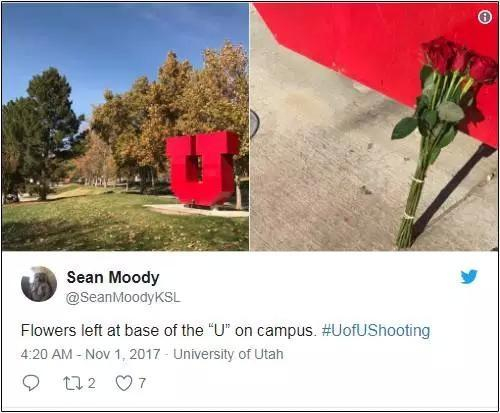 枪击案发生后，学生在学校标志性建筑下方摆花以示哀悼