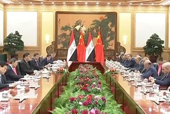 习近平会见伊拉克总理