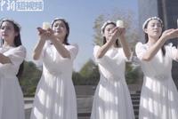 南京大学生唱响《生命之光》 祈世界和平