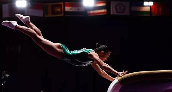 8月23日，现年43岁的乌兹别克斯坦选手丘索维金娜在比赛中。新华社记者 王丽莉 摄