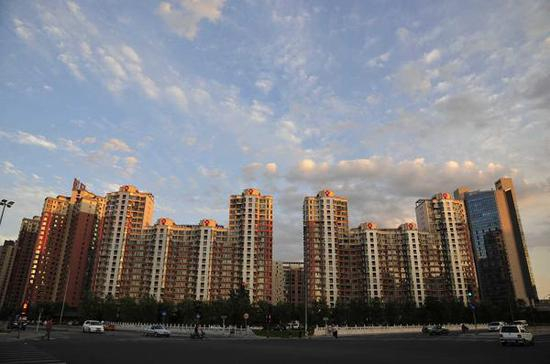 北京东三环附近的楼宇。视觉中国 资料图