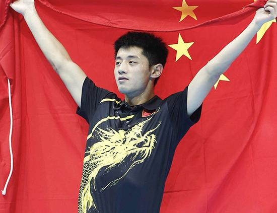 2012年伦敦奥运会，张继科身披国旗庆祝。 本文图均为 视觉中国 资料图