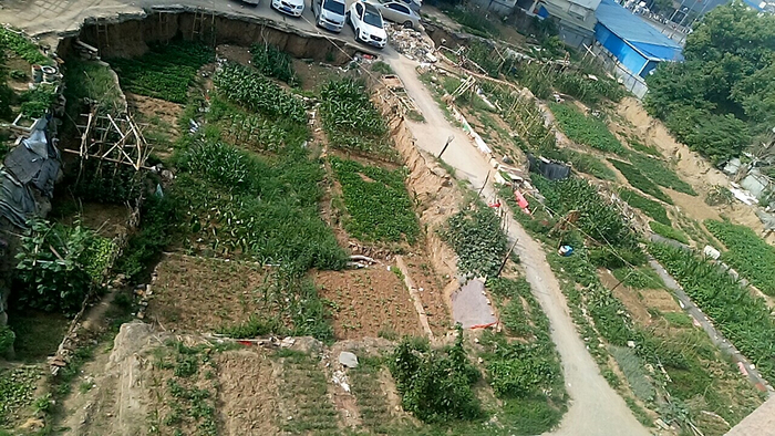 裕达花园项目有两个大坑。